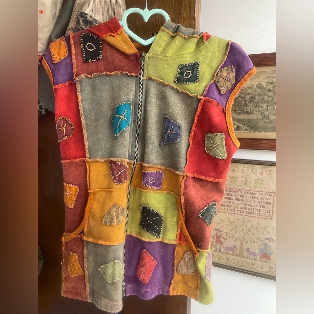 Rising International size M I believe mostly cotton hooded vest